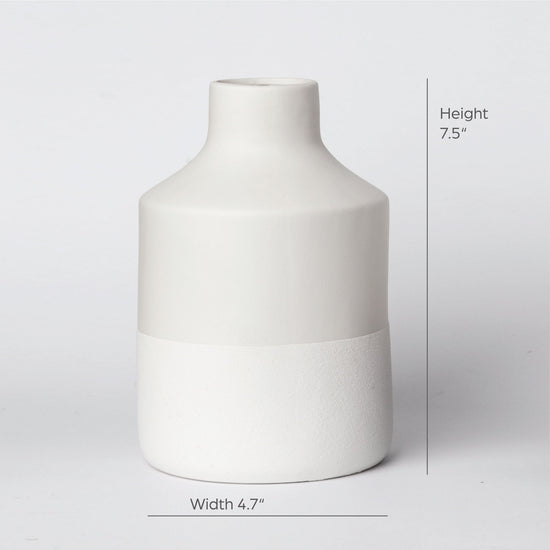Minimalist ceramic vase with matte finish, designed for modern home decor, by Porto Boutique.