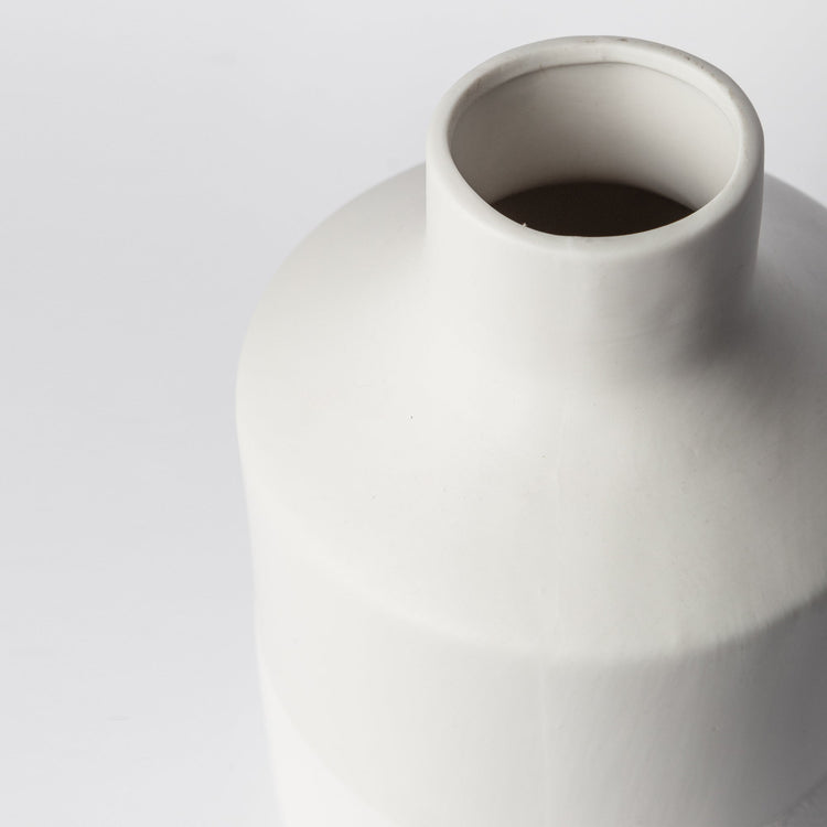 Minimalist ceramic vase with matte finish, designed for home decor, by Porto Boutique.