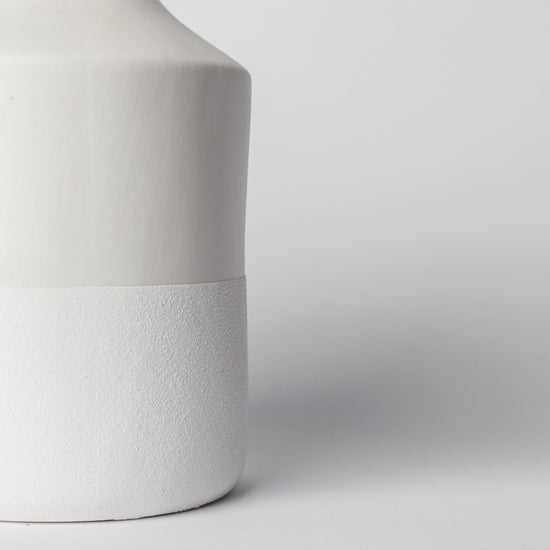 Porto Boutique minimalist ceramic vase with matte finish, modern home decor piece, sleek design, suitable for displaying flowers or accents.