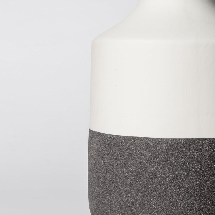 Minimalist ceramic vase with matte finish from Porto Boutique, featuring a sleek design suitable for modern home decor.