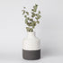 Minimalist ceramic vase with matte finish from Porto Boutique, showcasing a sleek, modern home decor piece.