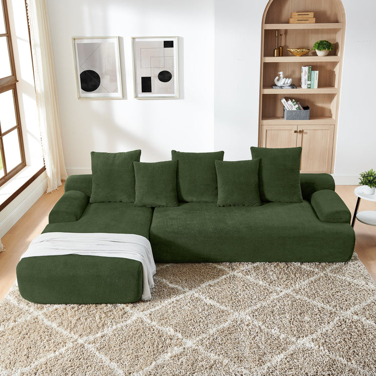 Green velvet L-shaped sectional sofa from HouseOfZazla featuring modern modular design and plush upholstery.