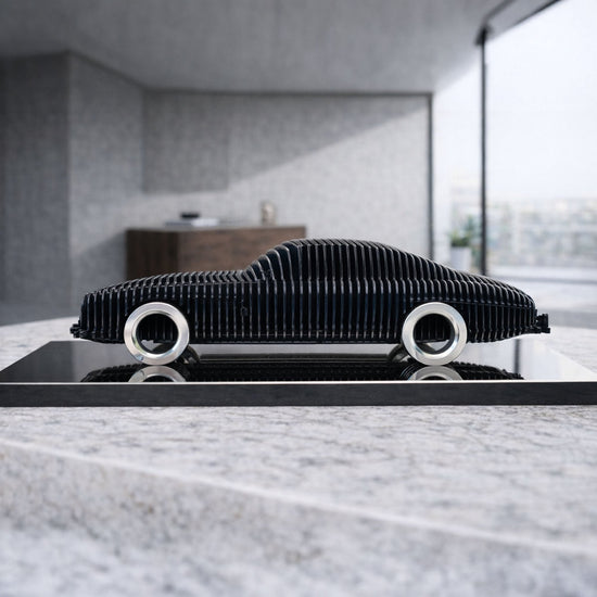 Handcrafted metal car sculpture by Modello Turbo featuring CNC laser-cut steel, aluminum alloy wheels, and a titanium stainless steel base.