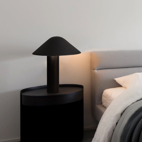 Modern minimalist bedside table lamp by FLIPSTYLEZLLC with a sleek design, perfect for bedroom or study lighting.