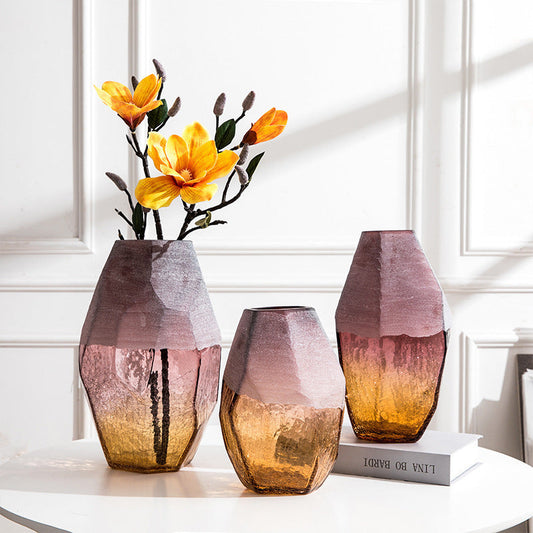 Set of three handmade blown glass vases by FLIPSTYLEZLLC with geometric faceted design and ombre purple amber finish.
