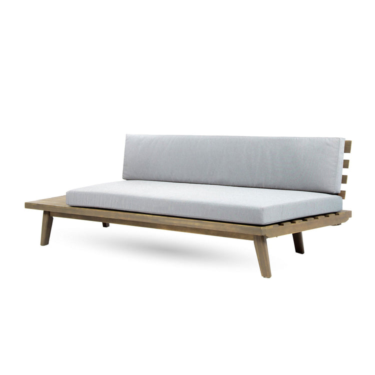 HouseOfZazla Hillcrest 2 Seater Outdoor Sofa with acacia wood frame and plush cushions on a patio setting.