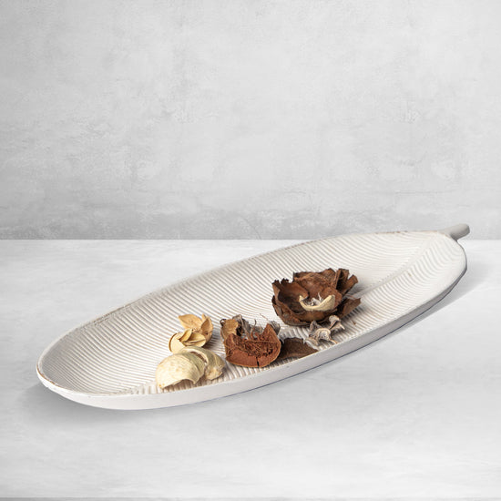 White Porto Boutique leaf design wood tray with elegant MDF finish, ideal for home décor and event serving.