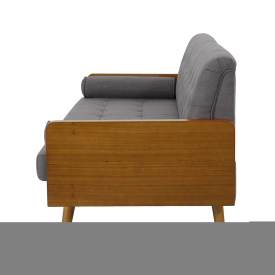 A grey fabric Aidan Mid Century Modern tufted sofa with cushioned back and armrests, stylishly designed for living room comfort.