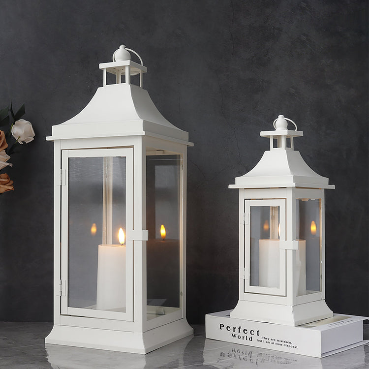Set of two JHY DESIGN outdoor decorative candle lanterns, 19.5 and 13 inches tall with glass panels and metal frame for outdoor decor.