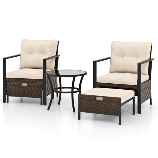 Four-piece white wicker outdoor chair set with glass-topped coffee table, ideal for patio seating and outdoor entertaining.