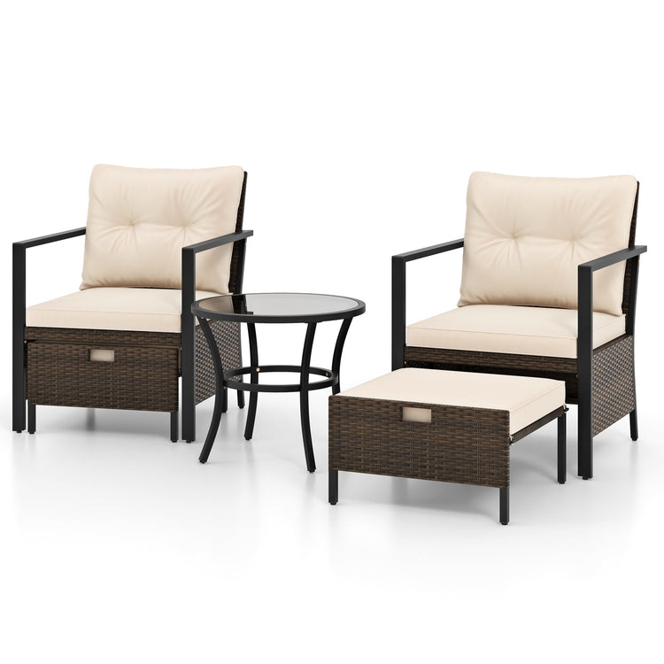 Four-piece white wicker outdoor chair set with glass-topped coffee table, ideal for patio seating and outdoor entertaining.