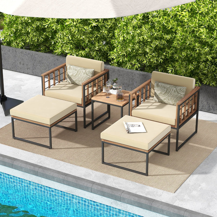Five-piece outdoor chair set with acacia wood, including chairs, ottomans, and a coffee table for patio seating.