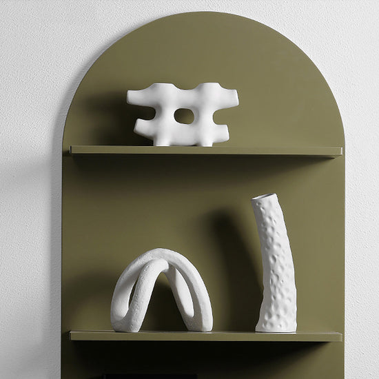 Creative ceramic vase by FLIPSTYLEZLLC with a modern design, ideal for living room flower arrangements and home decor.
