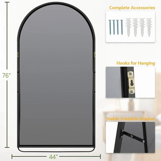 Oversized freestanding arched floor mirror with a gold aluminum frame, full-length design, by MIRRORONS.