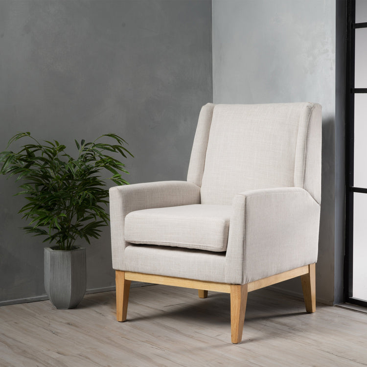 Beige fabric mid-century modern accent chair with padded cushion seat, ideal for home or office seating.