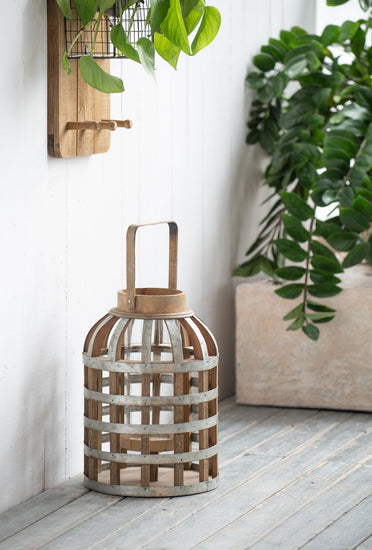 Decorative wooden lantern with handle from HouseOfZazla, suitable for indoor, outdoor, garden, or wedding decor.