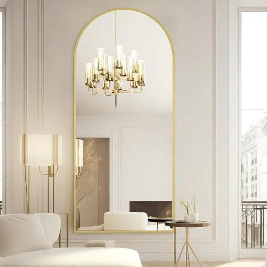 Large arched floor mirror with gold frame by MIRRORONS, full-length design for bedroom, living room, or gym, hanging or leaning style
