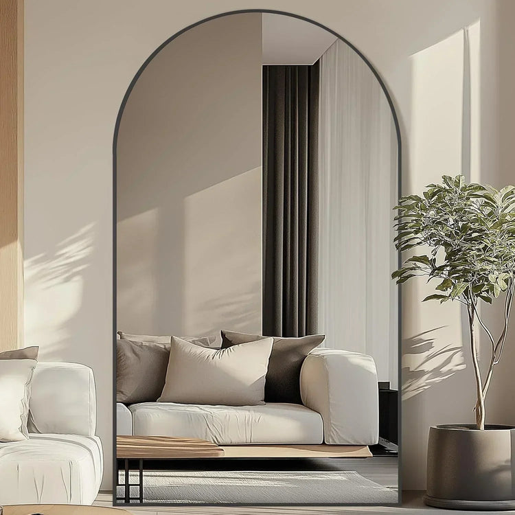 Oversized freestanding arched floor mirror with gold aluminum frame, full-length design by MIRRORONS.