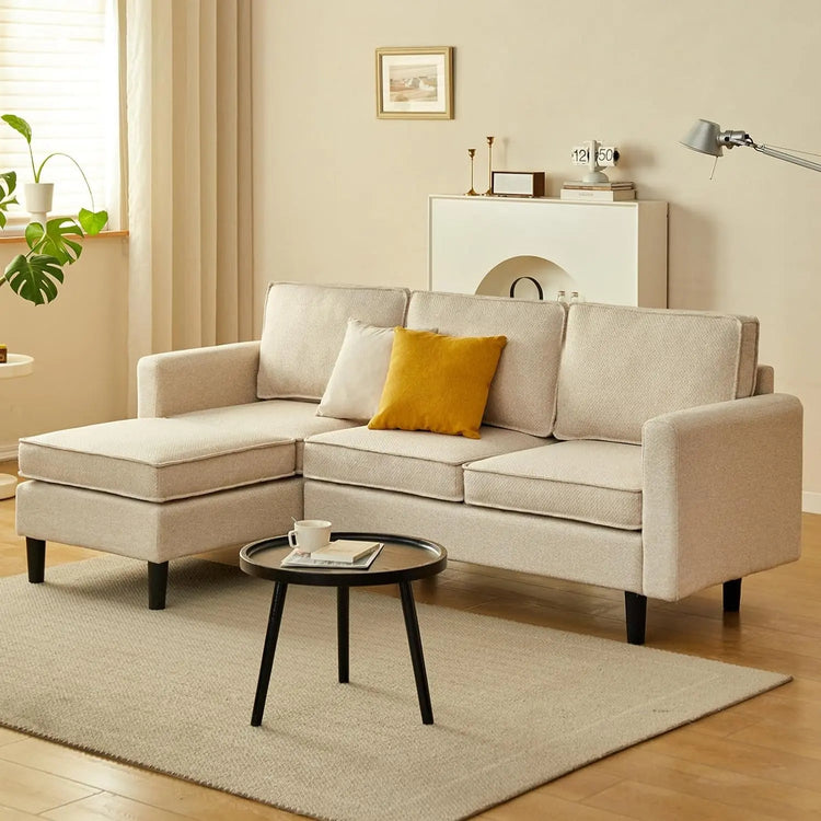 Canva Home Gareth corner modular sofa couch with 3 seats and convertible bed feature, shown in a modern living room setting.