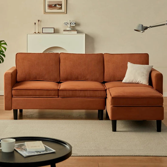 Canva Home Gareth corner modular sofa with 3 seats, convertible into a bed, shown in a modern living room setting.