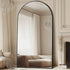 Full-length freestanding arched floor mirror with gold aluminum frame, oversized design by MIRRORONS.
