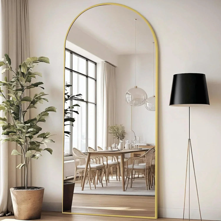 Large arched full-length mirror with gold frame by MIRRORONS, ideal for bedroom, living room, or gym, hanging or leaning.