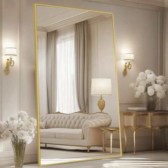 Oversized freestanding arched full-length mirror with gold aluminum frame, designed by MIRRORONS.
