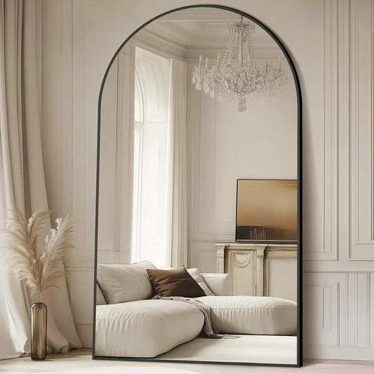 Oversized freestanding arched floor mirror with a gold aluminum frame, full-length design by MIRRORONS.