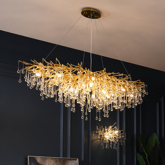 Decorbites Postmodern Light Luxury Crystal Chandelier with Water Drop Design, creating elegant atmosphere and shimmering illumination.