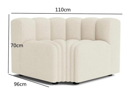 Off-white modern curved sofa by FLIPSTYLEZLLC featuring plush lamb velvet upholstery and sectional design in a stylish living room setting.