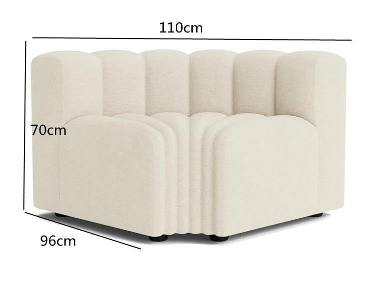 Off-white modern curved sofa by FLIPSTYLEZLLC featuring plush lamb velvet upholstery and sectional design in a stylish living room setting.