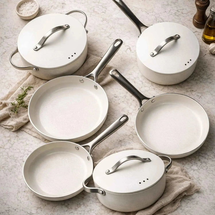 Alva Cookware 8-piece cookware set includes pots and pans with lids, stainless steel handles, suitable for all stove types.