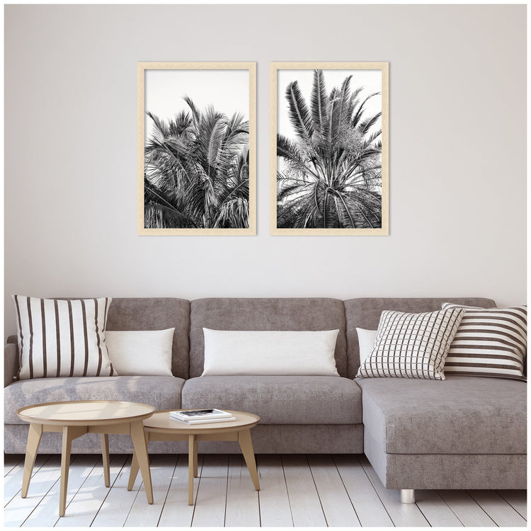 Two framed wall art pieces from the Alicia Bock Palm 2-Piece Set by kateandlaurel, featuring botanical palm designs.