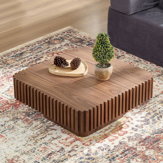Modern 31.5-inch walnut drum coffee table with round pedestal base, sleek and stylish for contemporary living rooms.
