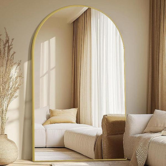 Gold aluminum framed arched full-length floor mirror with shatterproof tempered glass, freestanding or wall-mounted by MIRRORONS.