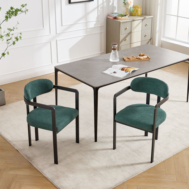 Set of two HouseOfZazla dining arm chairs with wooden legs and upholstered seats, ideal for modern dining rooms.