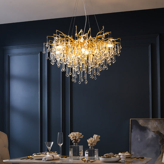 Decorbites Postmodern Light Luxury Chandelier with water drop crystal design hanging from a metal frame.