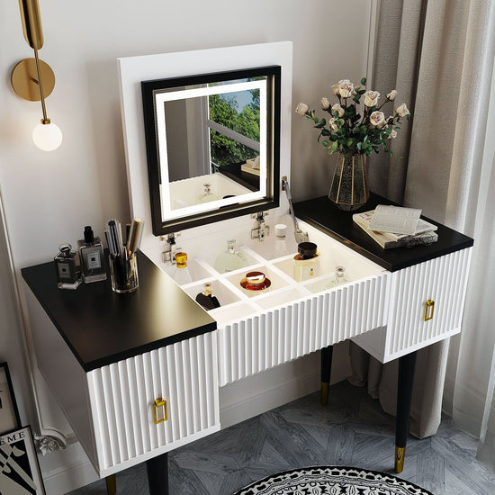 Sleek vanity table featuring black and white finish with LED lighting