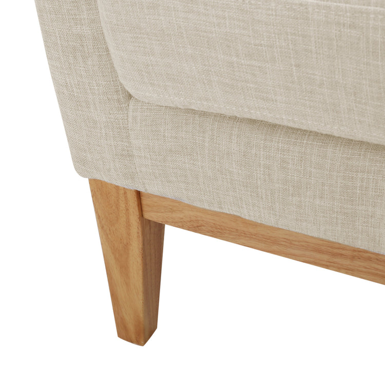 Beige mid-century modern accent chair with padded cushion seat, ideal for home or office seating.