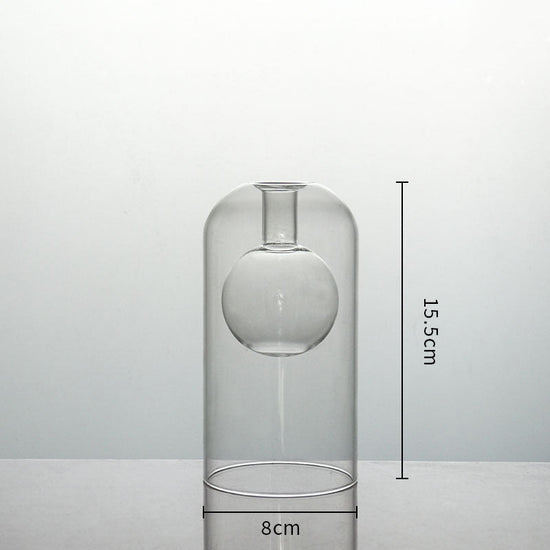 Clear glass vase by FLIPSTYLEZLLC with double container design, ideal for modern home decor, wedding decoration, or hydroponic plants.