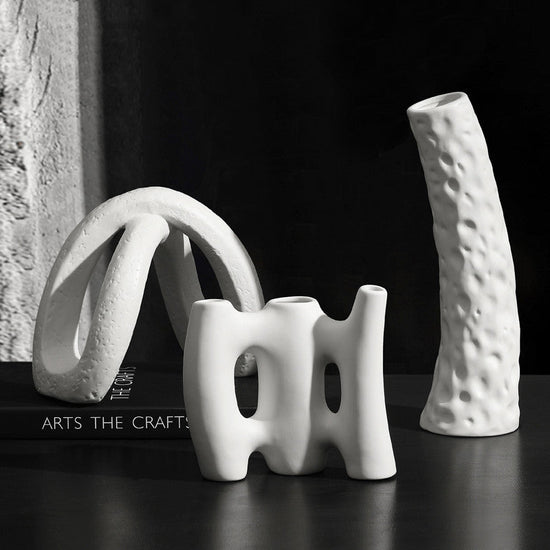 Ceramic vase from FLIPSTYLEZLLC with a modern design, ideal for living room flower arrangements and home decor.
