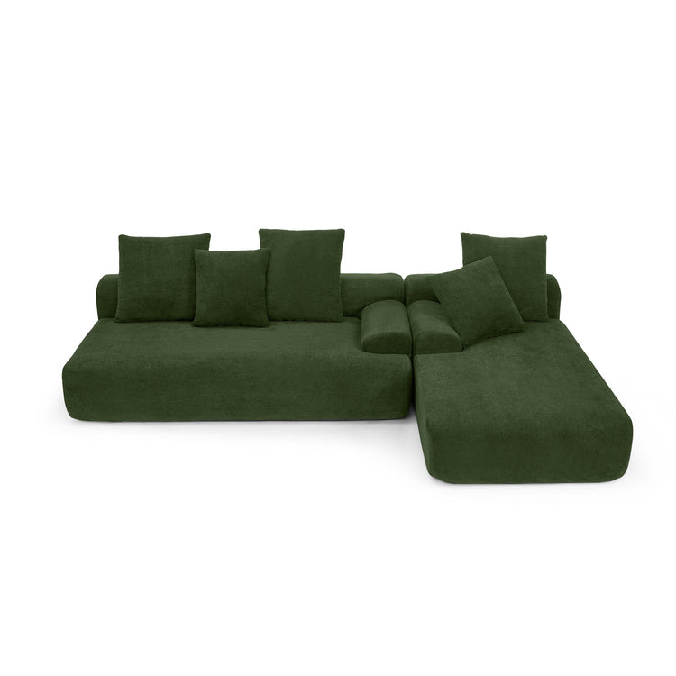 Green velvet L-shaped sectional sofa from HouseOfZazla, modern modular couch with plush cushions and sleek design.