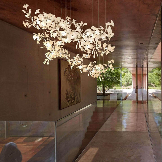 Gingko Style H chandelier by Vinlighting featuring an Art Deco linear design with leaf-shaped accents and elegant lighting elements.