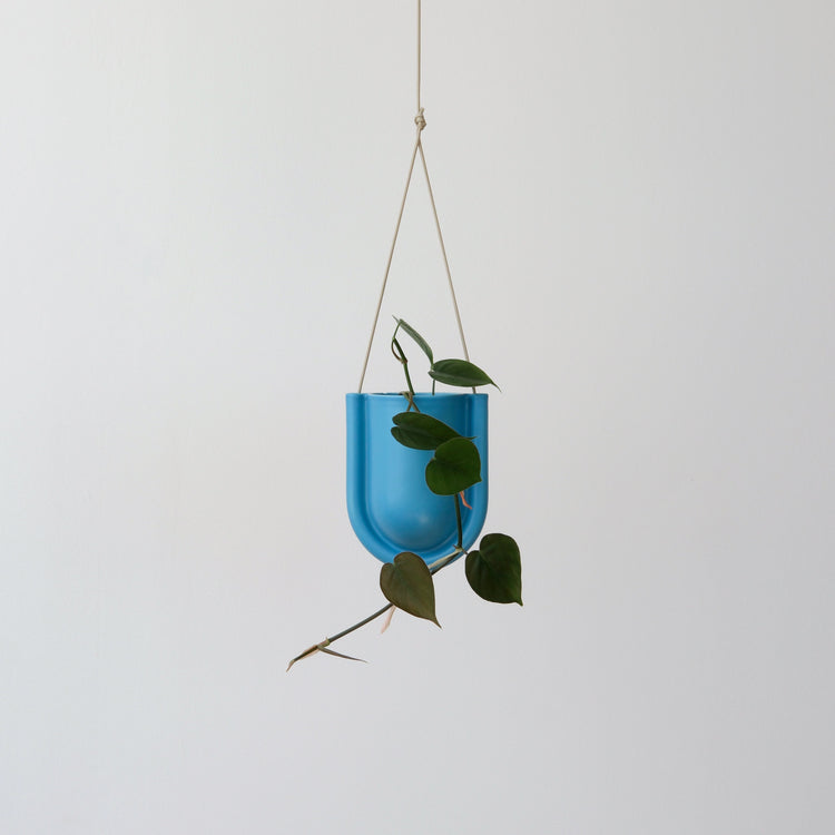 Blue Misewell Portico planter with a sleek, modern design, perfect for indoor or outdoor plant displays.