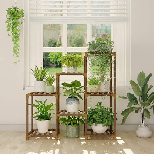 wooden plant stand with multiple pots