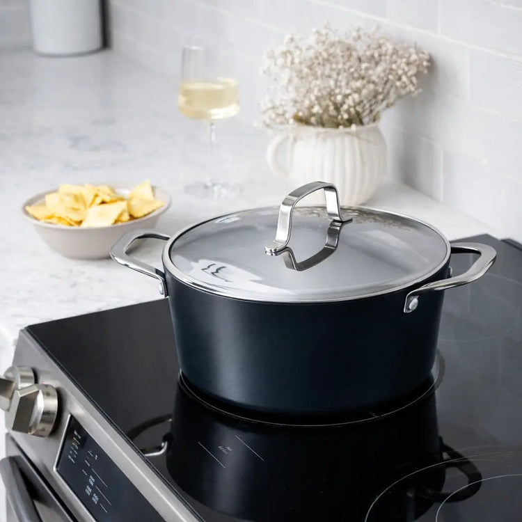 Alva Cookware 4.5-quart stock pot with lid, stainless steel construction, suitable for soups and stews.