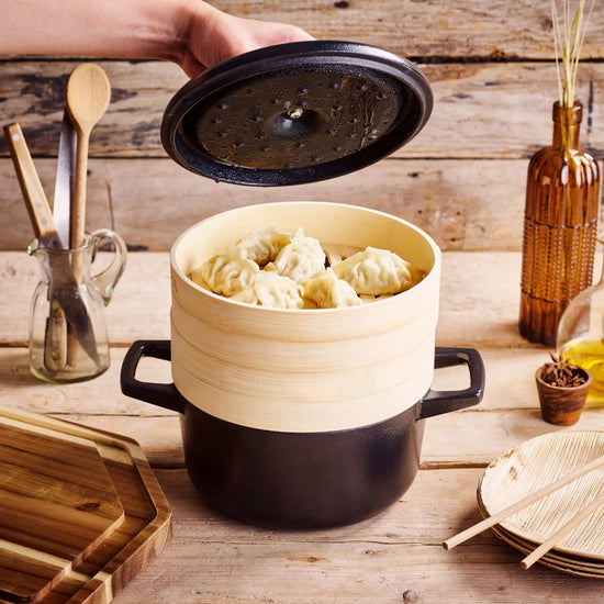 Alva Cookware 2.5 QT Dutch oven with steamer inserts, durable cast iron cocotte for versatile cooking and steaming.