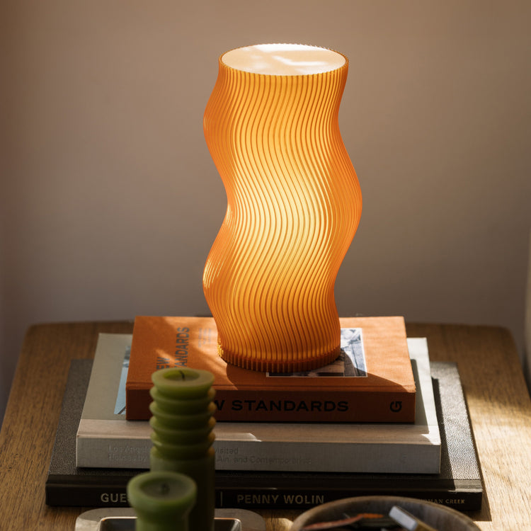 Terra Labs Woogie Table Lamp with a playful, rounded design and soft glow, perfect for modern living room or bedroom decor.