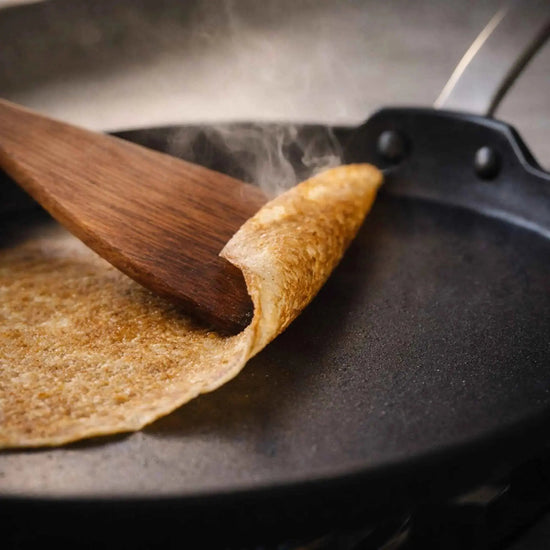 10-inch Alva Cookware crepe and egg pan with non-stick surface, ideal for making pancakes, crepes, and eggs.