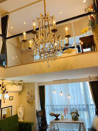 Early American Mooiehome chandelier, 25.2 inches tall, with antique-style metal frame and multiple candle-style light fixtures.